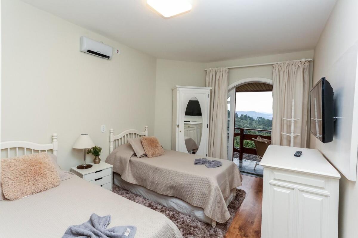 Quatro Estações Hospeda Quatre 412- Flat nas montanhas perfeito para relaxar Apartamento Campos do Jordão